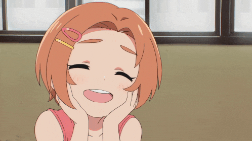 a girl with a pink hair clip on her head laughs