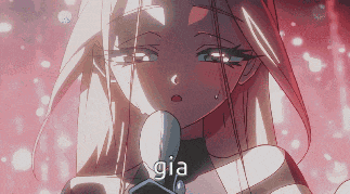 a girl with long hair is holding a microphone and the word gia is visible in the corner