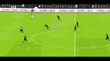 a soccer game is being played in front of a banner that says ' enzo castellano ' on it