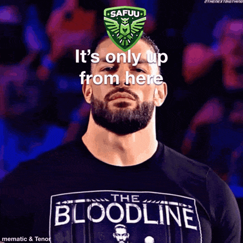 a man wearing a shirt that says the bloodline