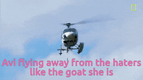 a helicopter is flying in the sky with the words " i vi flying away from the haters like the goat she is " below it