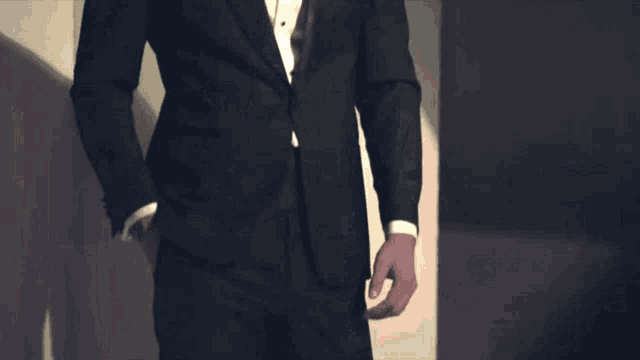 a man in a tuxedo with a bow tie