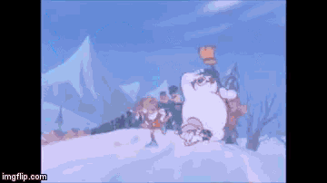a snowman with a trophy on his head is surrounded by people in a snowy scene ..