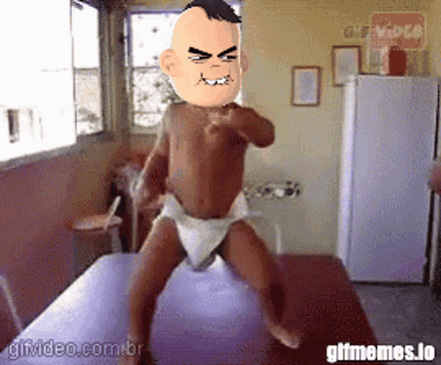 a gif of a baby in a diaper is being displayed on gifvideos.com.br
