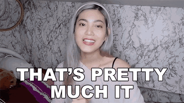 a woman is smiling and says that 's pretty much it .