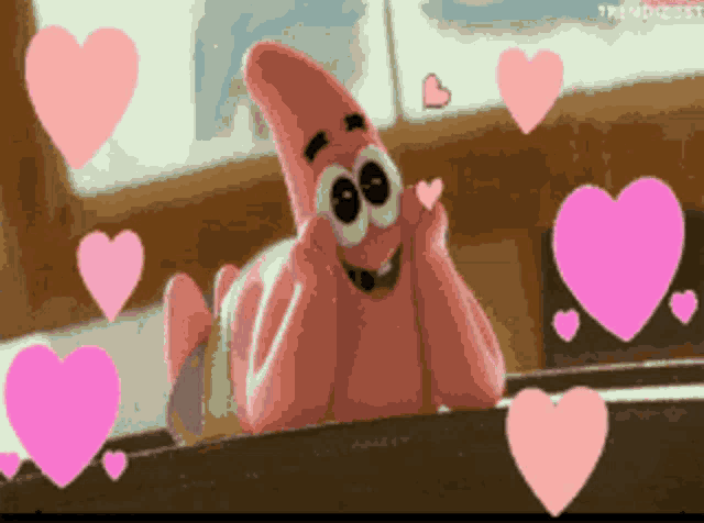 patrick star from spongebob is surrounded by hearts