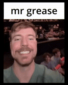 a man with a beard and mustache is smiling in front of a crowd with the words mr grease above him