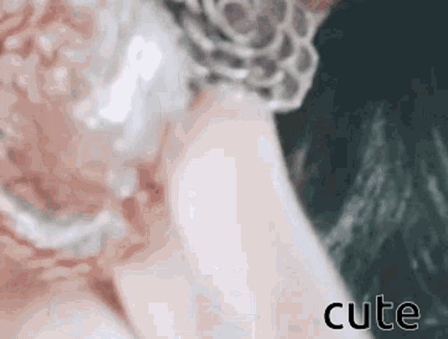 a close up of a woman 's torso with the word cute below her