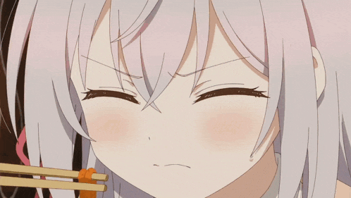 a girl with white hair is holding chopsticks in her mouth