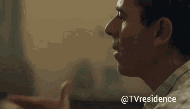 a close up of a man 's face with the hashtag @tvresidence