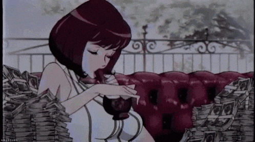 a woman is sitting on a couch with a stack of money .