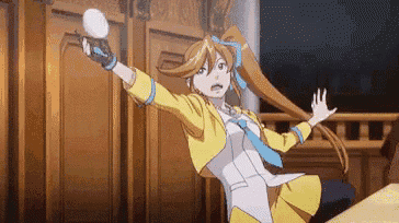 a woman in a yellow jacket and tie is holding a white object in her hand .