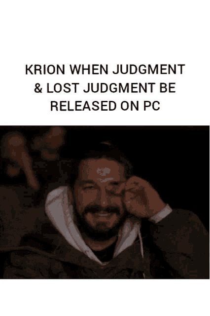a man with a beard is covering his eyes with his hand while watching a movie titled krion