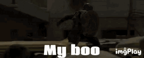 a gif of captain america holding a shield with the words my boo on it