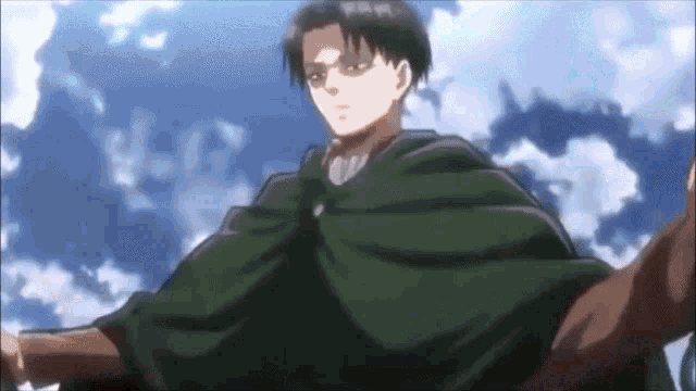 a man wearing a green cape is standing in front of a blue sky .