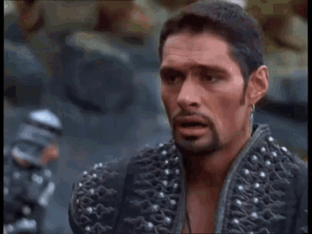 a man with a beard is saying i 'll kill you