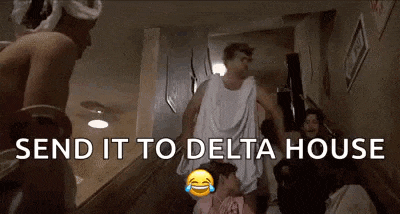 a group of people are standing on a set of stairs in a room with the words `` send it to delta house '' .
