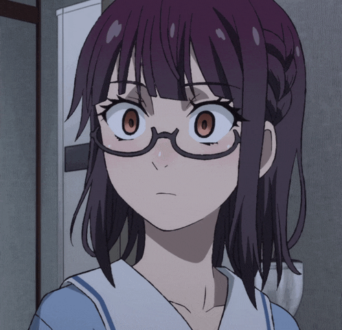 a girl with purple hair and glasses looks angry