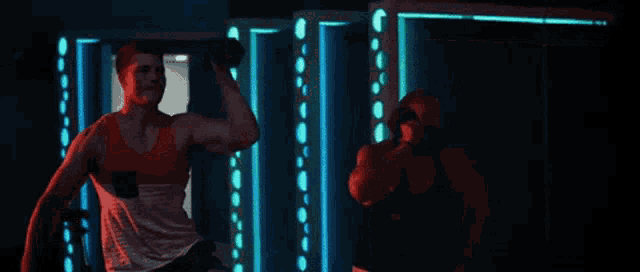a man and a woman are dancing together in a dark room .
