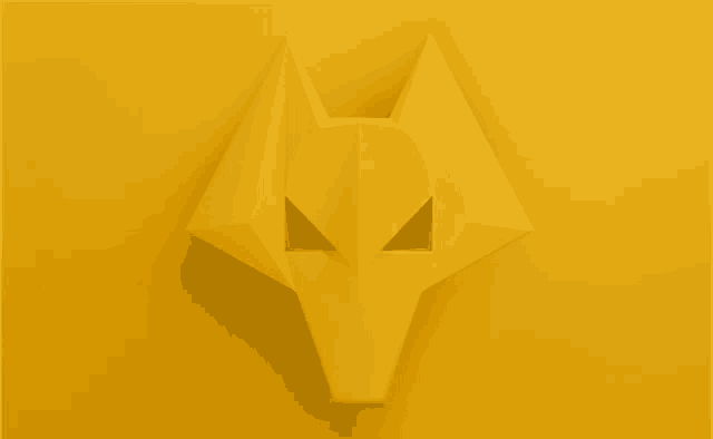 a yellow origami fox 's head is on a yellow background