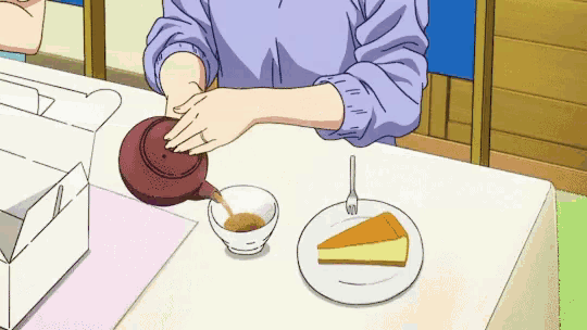 a person is pouring tea into a cup on a table with a piece of cheesecake on a plate .
