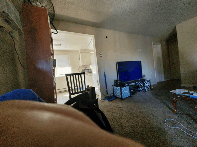a living room with a large flat screen tv