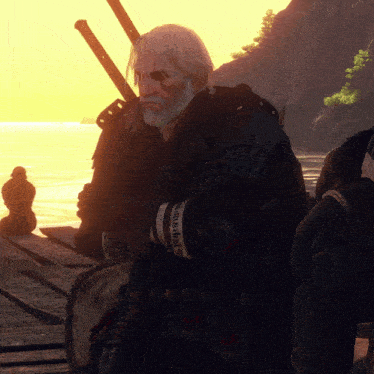 a man with a beard is holding a sword and wearing a bracelet that says ' samurai '