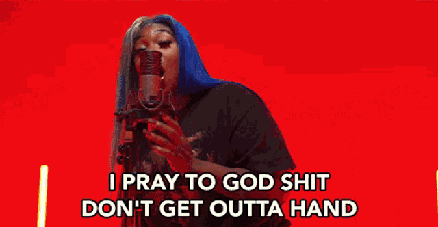 a woman with blue hair singing into a microphone with the words " i pray to god shit don 't get outta hand "