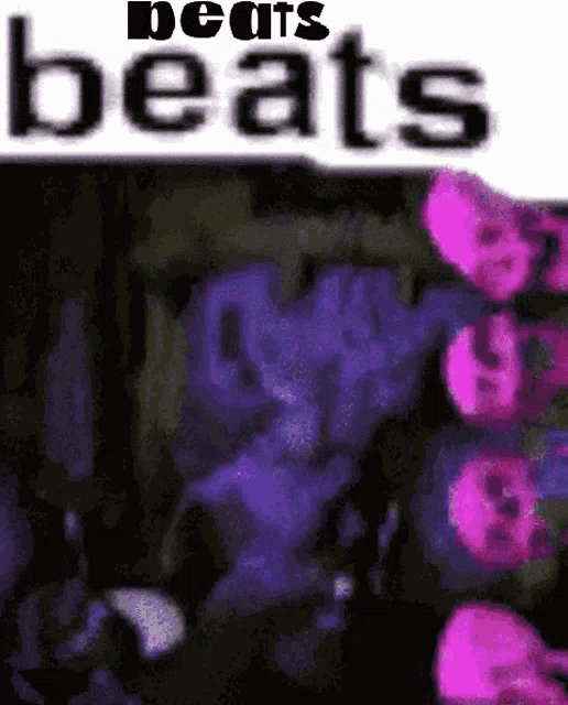 a blurry picture with the words beats written on it