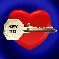 a key that says key to is in a red heart