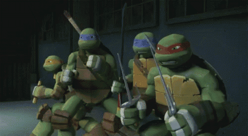 a group of teenage mutant ninja turtles are holding swords in a dark room