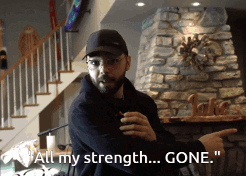 a man says " all my strength ... gone " in a living room