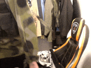 a person is standing in front of a ftw chair