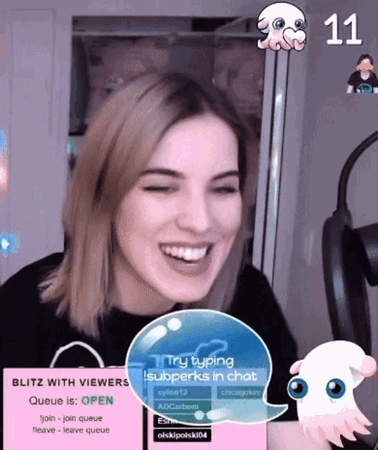 a woman is smiling in front of a sign that says try typing isuberks in chat