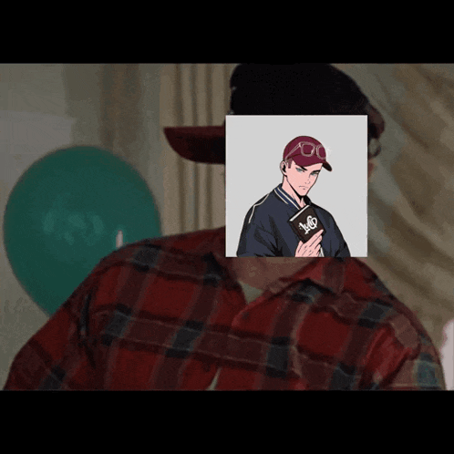 a man wearing a plaid shirt has a picture of a man holding a book behind him