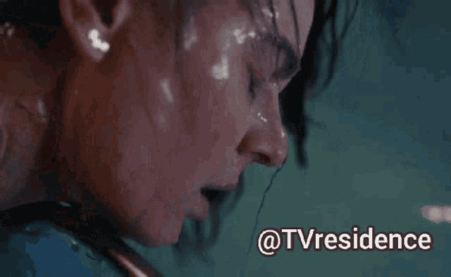 a close up of a woman 's face with the hashtag @tvresidence