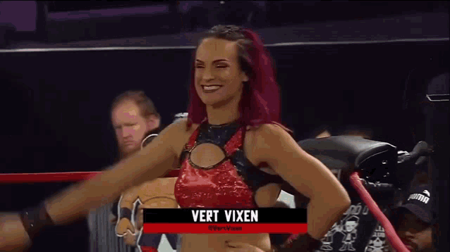 a woman in a wrestling ring with the name vert vixen on the bottom