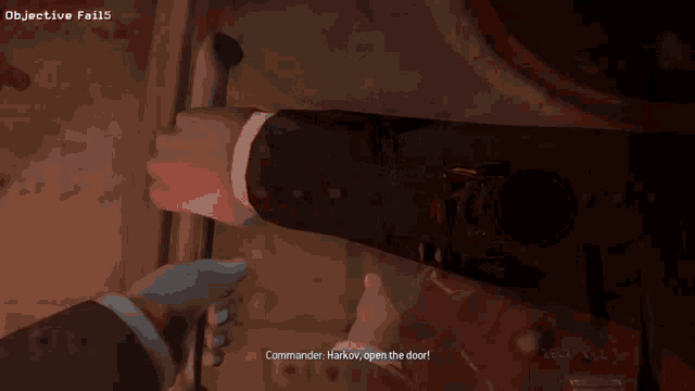 a man in a suit is holding a door handle in a video game where the objective failed