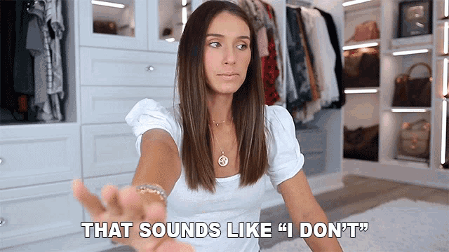 a woman says that sounds like " i don 't " in front of a closet