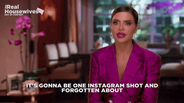 a woman in a purple jacket is talking about instagram