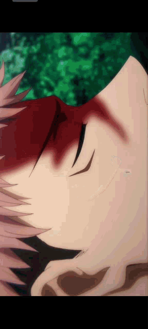 a close up of a person 's face with a bloody nose