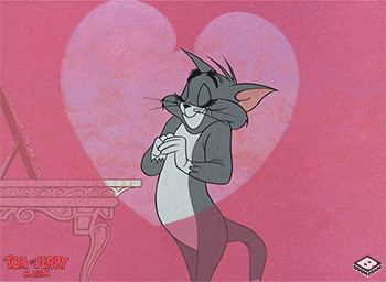 a cartoon of tom and jerry standing in front of a heart
