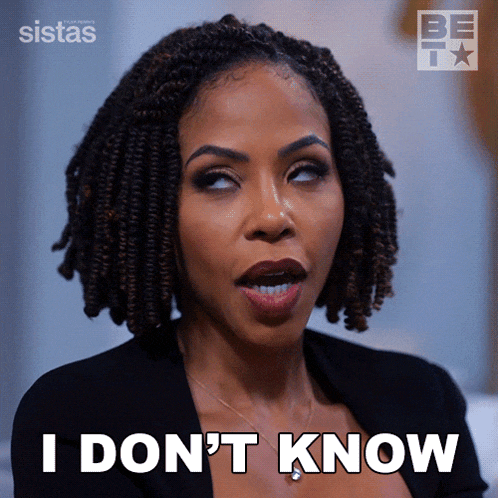 a woman with dreadlocks is making a face and says i don t know