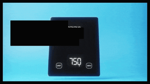 a black digital scale with the number 750 on the screen