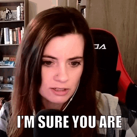 a woman in a gaming chair says i 'm sure you are in front of a microphone