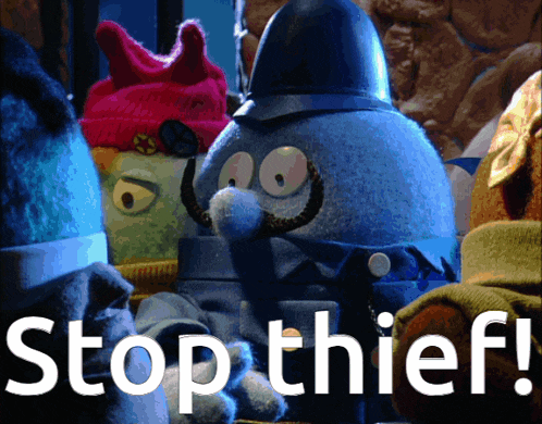 a group of stuffed animals are standing next to each other with the words " stop thief " in white letters