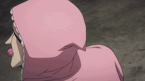 a close up of a person 's back with a pink hood