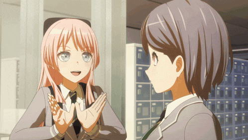 a girl with pink hair talks to another girl with gray hair