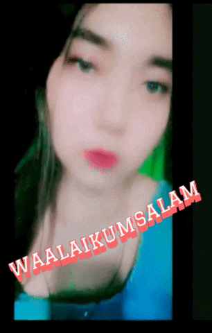 a close up of a woman 's face with the words waalaikumsalam on the bottom