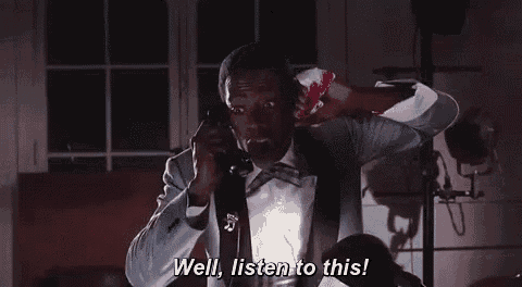 a man in a tuxedo is talking on a cell phone and says `` well , listen to this ! ''